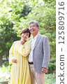 Senior couple enjoying the fresh greenery, couple, middle-aged, date, walk 125809716