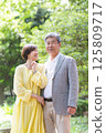 Senior couple enjoying the fresh greenery, couple, middle-aged, date, walk 125809717