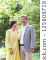 Senior couple enjoying the fresh greenery, couple, middle-aged, date, walk 125809719