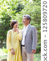 Senior couple enjoying the fresh greenery, couple, middle-aged, date, walk 125809720