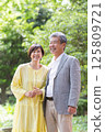 Senior couple enjoying the fresh greenery, couple, middle-aged, date, walk 125809721