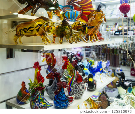 Venetian glass souvenirs on store shelves 125810973
