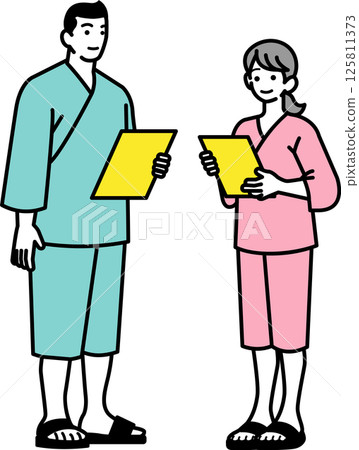 Male and female couple holding an examination list 125811373