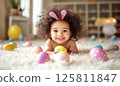 Adorable Baby Girl with Easter Bunny Ears 125811847