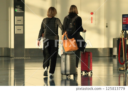 Foreign visitors to Japan heading to immigration Foreign visitors to Japan heading to immigration 125813779