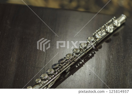 Flute on the desk Flute on the desk 125814937