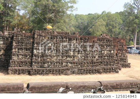 Impressive reliefs decorating the terrace of King Angkor Thom Impressive reliefs decorating the terrace of King Angkor Thom 125814943