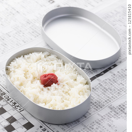 A Japanese flag lunch in an aluminum lunch box A Japanese flag lunch in an aluminum lunch box 125815410