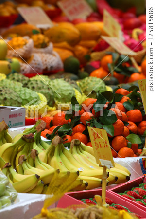 Fruits such as oranges sold at the open-air market. Most of them are imported. Fruits such as oranges sold at the open-air market. Most of them are imported. 125815686