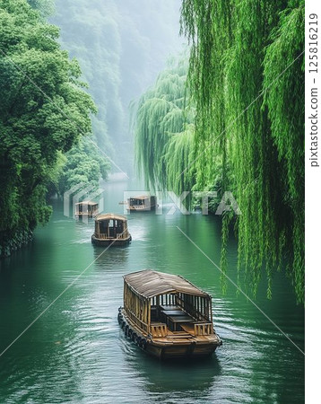Misty River Scene with Wooden Boats 125816219