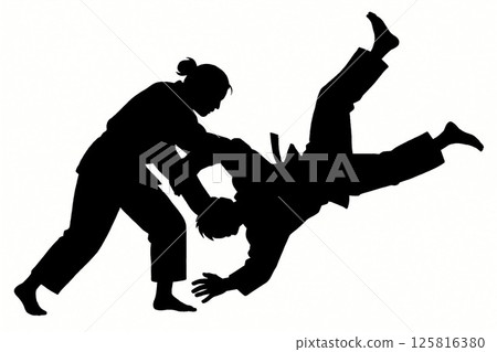 A powerful silhouette of a judo throw 125816380