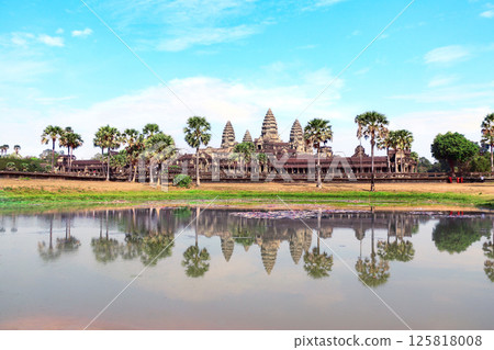 Famous landmark - temple complex Angkor Wat (Angkor Thom), Siem reap, Cambodia. Topic of tours, travel, trip abroad on vacation. Complex is a prominent symbol of Cambodia and a key tourist attraction 125818008