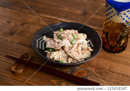 Chicken breast with plum and sesame sauce 125818387