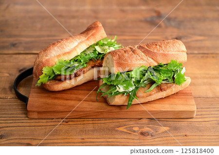 Pork belly miso-marinated baguette sandwich Pork belly miso-marinated baguette sandwich 125818400