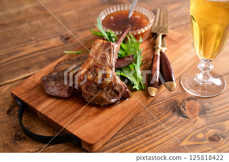 Lamb chops with marmalade sauce 125818422