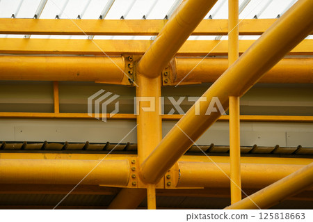 Modern Translucent Roof Structure with Yellow Steel Beams Modern Translucent Roof Structure with Yellow Steel Beams 125818663