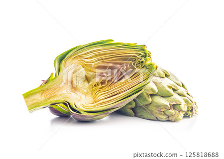 Ripe artichokes plant isolated on white background. Ripe artichokes plant isolated on white background. 125818688