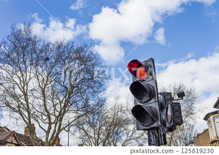 Traffic light displaying red signal 125819230