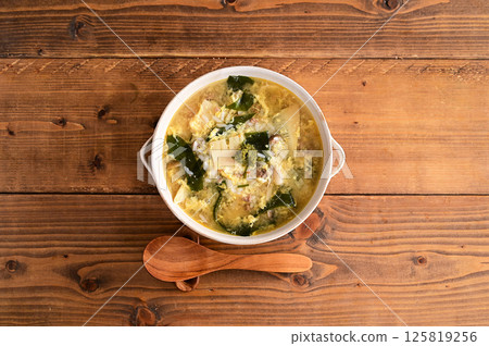 Rice porridge with wakame seaweed and bamboo shoots Rice porridge with wakame seaweed and bamboo shoots 125819256