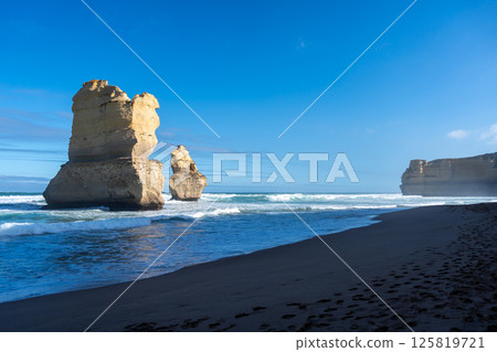 Clifton Beach and Twelve Apostles along the Great Ocean Road, Australia 125819721