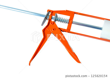 Orange caulking gun with silicone adhesive on white background. Orange caulking gun with silicone adhesive on white background. 125820154
