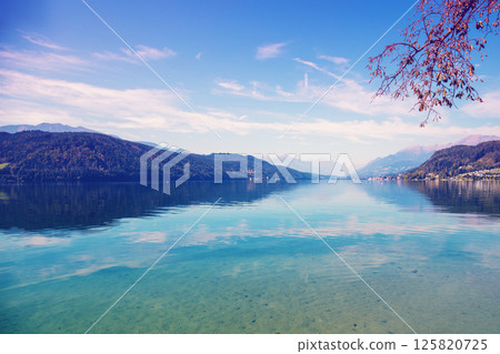 View of mountain lake in autumn. Millstaetter See Austria Europe View of mountain lake in autumn. Millstaetter See Austria Europe 125820725