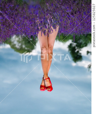 Red shoes, lavender field, summer fun. Legs in the air, enjoying nature's beauty. Red shoes, lavender field, summer fun. Legs in the air, enjoying nature's beauty. 125825027