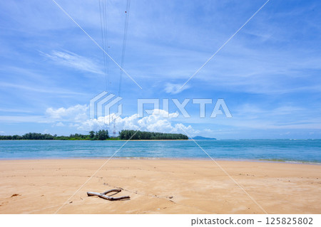 Beautiful sandy beach and sea in sunny day,Blue sky in good weather day, Beach sea space area nature background 125825802