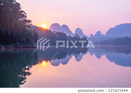 Nature beautiful light sunset or sunrise over mountains,Colorful sunset sky with clouds landscape,Wide angle nature background Nature beautiful light sunset or sunrise over mountains,Colorful sunset sky with clouds landscape,Wide angle nature background 125825844
