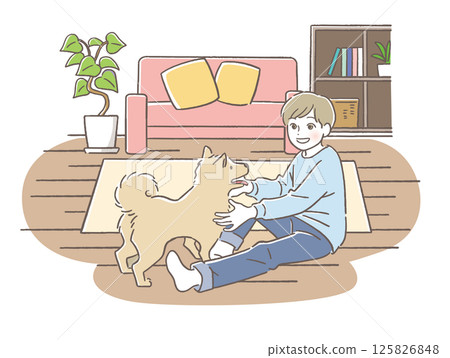 Dog and child playing in the living room 125826848
