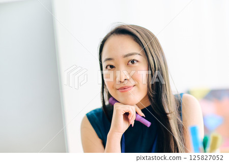 a working woman a working woman 125827052