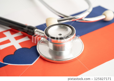 Slovakia flag with black stethoscope, Business and finance. 125827171