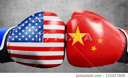 USA or United States of America and China flags painted on two boxing gloves. Concept of the United States of America versus China trade war disputes or economic conflict 125827809