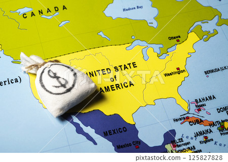 Map of the USA or the United States of America with a money bag of dollars. Concept of the United States of America versus China trade war disputes or economic conflict Map of the USA or the United States of America with a money bag of dollars. Concept of the United States of America versus China trade war disputes or economic conflict 125827828