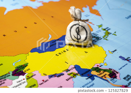 Map of China with a money bag of dollars. Concept of the United States of America versus China trade war disputes or economic conflict Map of China with a money bag of dollars. Concept of the United States of America versus China trade war disputes or economic conflict 125827829