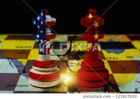 USA or United States of America and China flags painted on two chess kings with a world map on the chessboard. Concept of United States of America versus China trade war disputes or economic conflict USA or United States of America and China flags painted on two chess kings with a world map on the chessboard. Concept of United States of America versus China trade war disputes or economic conflict 125827830