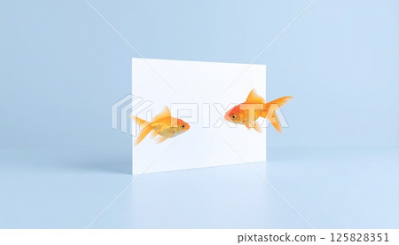 White paper and swimming goldfish 125828351