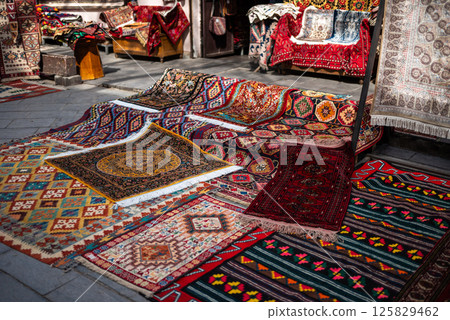 Georgian and Caucasian traditional carpets store in Old town Tbilisi, Georgia 125829462