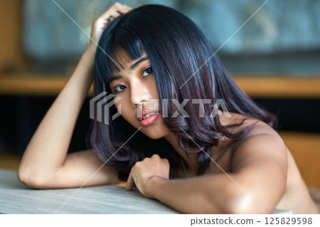 Close-Up portrait of young beautiful asian girl Close-Up portrait of young beautiful asian girl 125829598