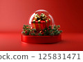 3D rendering of a Christmas decoration inside a glass ball with a gift box on a red background, a podium for product presentation. A New Year's atmosphere. 125831471