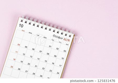 October 2026 desk calendar on pink background, Position with empty space. 125831476