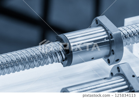 Closeup scene the spare parts lead ball screw set in the light blue scene. Closeup scene the spare parts lead ball screw set in the light blue scene. 125834113