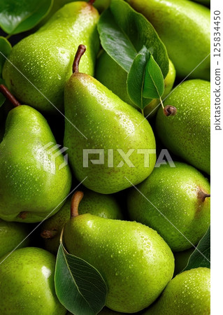 Overhead view of glossy ripe pears forming seamless golden green fruit composition 125834450