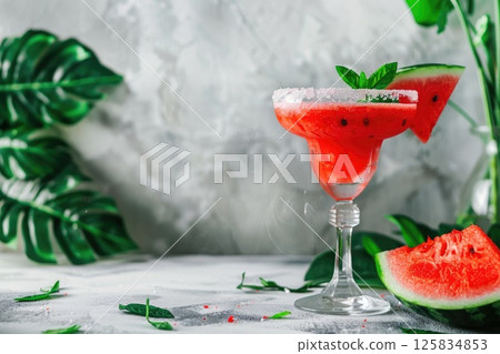 Refreshing Watermelon Cocktail in Sunlit Summer Setting Refreshing Watermelon Cocktail in Sunlit Summer Setting 125834853