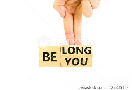 Belonging and belong symbol. Concept words Be you Belong on beautiful wooden block. Beautiful white background Businessman hand. Business motivational belonging and belong concept. Copy space. Belonging and belong symbol. Concept words Be you Belong on beautiful wooden block. Beautiful white background Businessman hand. Business motivational belonging and belong concept. Copy space. 125835134