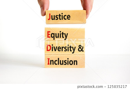 Justice equity diversity inclusion symbol. Concept words JEDI Justice Equity Diversity Inclusion on blocks. Beautiful white background. Business justice equity diversity inclusion concept. Copy space Justice equity diversity inclusion symbol. Concept words JEDI Justice Equity Diversity Inclusion on blocks. Beautiful white background. Business justice equity diversity inclusion concept. Copy space 125835217