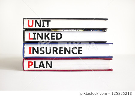 ULIP Unit Linked Insurance Plan symbol. Concept word ULIP Unit Linked Insurance Plan on beautiful books. Beautiful white background. Business ULIP Unit Linked Insurance Plan concept. Copy space. ULIP Unit Linked Insurance Plan symbol. Concept word ULIP Unit Linked Insurance Plan on beautiful books. Beautiful white background. Business ULIP Unit Linked Insurance Plan concept. Copy space. 125835218