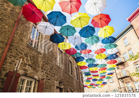 Lot of Umbrellas in Petit Champlain street Quebec city Lot of Umbrellas in Petit Champlain street Quebec city 125835578