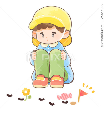 A boy wearing a hat observing a line of ants 125836009