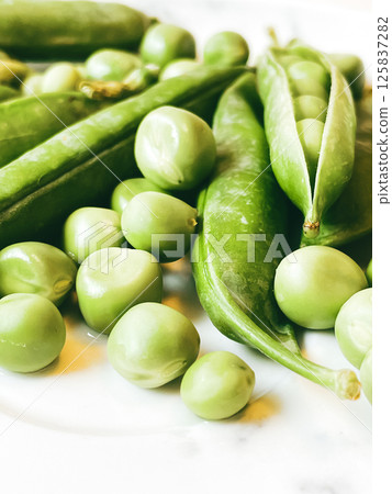 Harvest organic vegetables green peas. Harvest organic vegetables green peas. 125837282